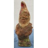 A painted cast iron garden gnome, height 13.5ins