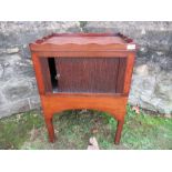 A 19th mahogany pot cupboard, with tambor sliding door, 18ins x 23ins, height 30.5ins