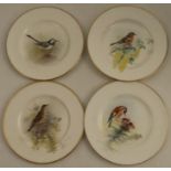 Four Royal Worcester small plates, decorated with a Thrush, a Goldfinch, a Chaffinch and a Water