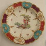 A Worcester plate painted with exotic birds in a wooded landscape surrounded by insects