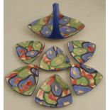 A Clarice Cliff Blue Chintz pattern basket and six dishes, of triangular shape - All pieces are in