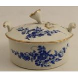 A Worcester butter dish decorated with dry blue flowers