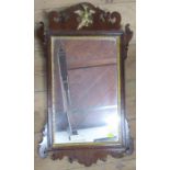 An Antique mahogany fret cut wall mirror, with gilt Ho-Ho bird decoration, overall dimensions
