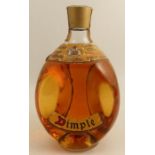 A bottle of John Haig & Co Ltd Dimple De Luxe Scotch Whisky