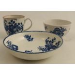 A Worcester coffee cup, tea bowl and saucer painted in underglaze blue with bunches of fruit