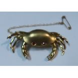 A 18ct gold 'Crab' brooch with ruby eyes and diamond claws