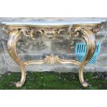 A marble topped consol table, with ornate gilt base, marble af, width 56ins, height 35ins