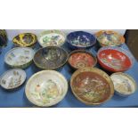 Twelve Carlton Ware bowls, decorated with Oriental landscapes, Egyptian themes, Eastern temples,