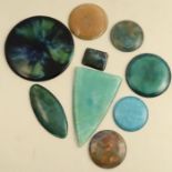 Six Ruskin pottery cabochon plaques, all unmounted, of various shapes, sizes and glazes, together