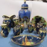 A collection of Crown Devon blue lustre, to include a large covered vase decorated with a garden