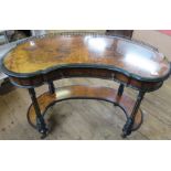 A 19th century Gillows & Co amboyna kidney shaped writing table, with galleried back, the drawer