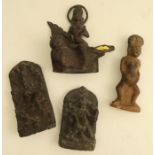 Four metal and stoneware Tibetan and Nepalese travelling shrine figures