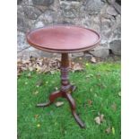 A mahogany dish topped wine table, diameter 15ins, height 24ins