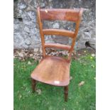 A 19th century mahogany ladder back chair