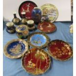 A collection of Carlton Ware, to include plates, a covered barrel, vases, some pieces in Rouge