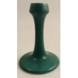 A Ruskin pottery candlestick, decorated in a green glaze, with West Smethwick mark, height 7ins