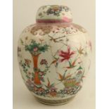 An early 19th century Chinese famille rose ginger jar and cover, decorated with lotus and precious