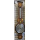 James Lucking & Co. a mahogany and satinwood banjo barometer, with silvered dials