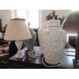 A pair of table lamps and two others