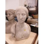 An Antique marble bust, of a woman with a plaited bun in her hair, height 19ins