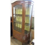 A display cabinet, with inlaid decoration, width 42ins, height 78ins