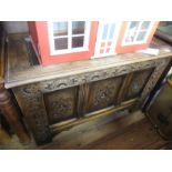 An Antique oak coffer, width 42ins