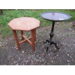 A wine table together with an arts and crafts style table