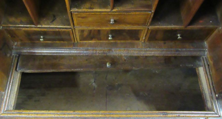 An Antique walnut bureau, with feather banding, the fall flap revealing pigeon holes and drawers - Image 3 of 3