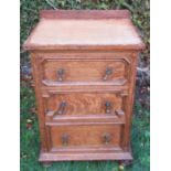 An oak three drawer bedside cabinet, 21ins x 16.5ins, height 30.5ins