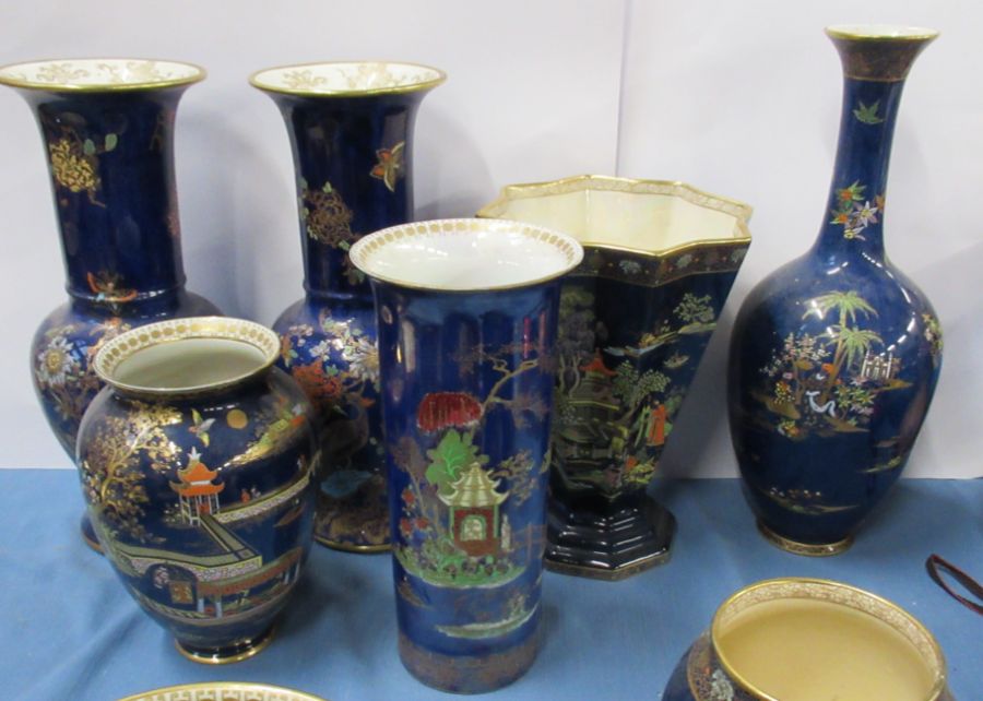 A pair of Carlton Ware vases, height 13ins, together with three other Carlton Ware vases and a Crown