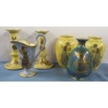 A pair of Crown devon candlesticks, together with a pair of vases, another vase and a jug, all