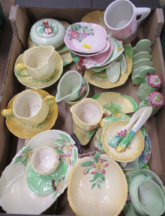 A collection of Carlton Ware leaf molded pieces, to include toast rack, condiment pots, jug, jam