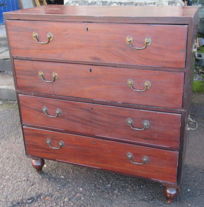 A 19th century mahogany campaigne chest, of four long drawers, with two pairs of handles to each