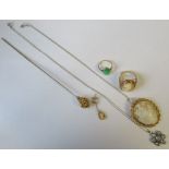 A collection of jewellery, to include a cameo set pendant, ring and single earring