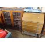 A bureau together with a glazed cabinet