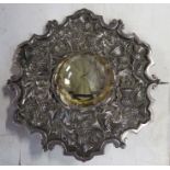 A large Scottish silver brooch, set with a yellow topaz, approx. 36.0mm diameter, the silver