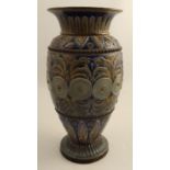 A 19th century Doulton Lambeth stoneware vase, relief decorated with leaves and swirls, dated