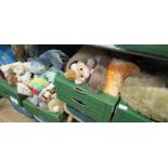 Four boxes of teddies and other soft toys