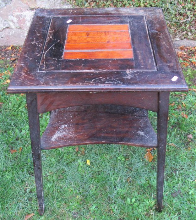 An Edwardian occasional table, with removeable reversable central section and shelf below, 21ins x