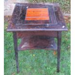 An Edwardian occasional table, with removeable reversable central section and shelf below, 21ins x