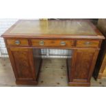 A 19th century mahogany pedestal desk, with leather writing surface, fitted with three frieze