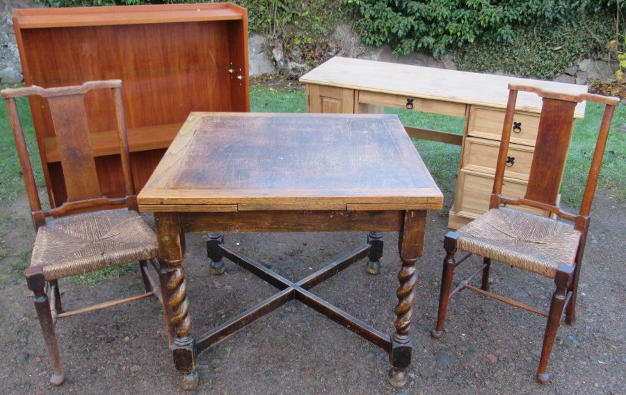 A collection of furniture, to include a bookcase, desk, drawer leaf table and a pair of chairs