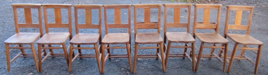 Eight beech and elm chairs, two with book holders to the back