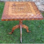 An inlaid square occasional table, the whole with geometric inlay, raised on a square column to four