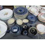 A collection of dinner ware and tea ware