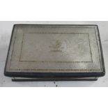 A 19th century mother of pearl rectangular box, engraved with a crest and flowers, with white