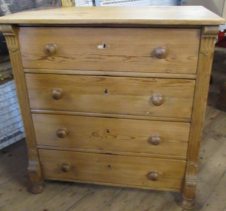 A pine chest, of four long drawers, with fluting to the sides, 39ins x 21ins, height 42ins