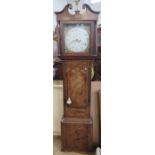 An Antique mahogany long case clock, the dial with fruit and flowers spandrels, height 84ins