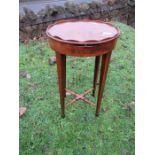 A 19th century mahogany kettle stand, width 14ins, height 27ins