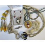 A collection of costume jewellery, to include necklaces, brooches, earrings, filigree box, etc